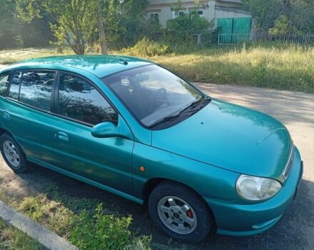 Зеленый Киа Рио, объемом двигателя 1.5 л и пробегом 270 тыс. км за 2600 $, фото 2 на Automoto.ua