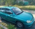 Зеленый Киа Рио, объемом двигателя 1.5 л и пробегом 270 тыс. км за 2600 $, фото 2 на Automoto.ua