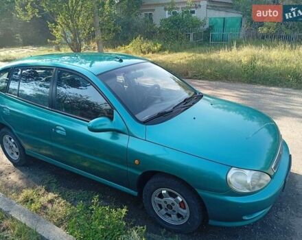 Зеленый Киа Рио, объемом двигателя 1.5 л и пробегом 270 тыс. км за 2600 $, фото 1 на Automoto.ua