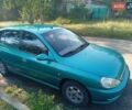 Зеленый Киа Рио, объемом двигателя 1.5 л и пробегом 270 тыс. км за 2600 $, фото 1 на Automoto.ua
