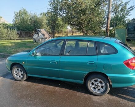 Зеленый Киа Рио, объемом двигателя 1.5 л и пробегом 270 тыс. км за 2600 $, фото 5 на Automoto.ua