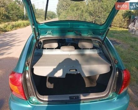 Зеленый Киа Рио, объемом двигателя 1.5 л и пробегом 270 тыс. км за 2600 $, фото 16 на Automoto.ua