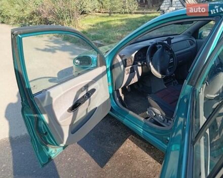 Зеленый Киа Рио, объемом двигателя 1.5 л и пробегом 270 тыс. км за 2600 $, фото 8 на Automoto.ua