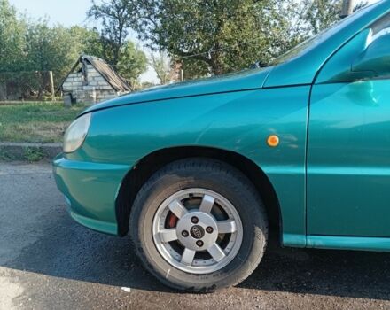 Зеленый Киа Рио, объемом двигателя 1.5 л и пробегом 270 тыс. км за 2600 $, фото 6 на Automoto.ua