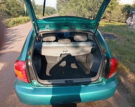 Зеленый Киа Рио, объемом двигателя 1.5 л и пробегом 270 тыс. км за 2600 $, фото 15 на Automoto.ua