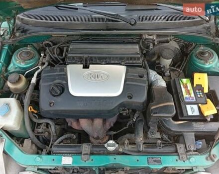 Зеленый Киа Рио, объемом двигателя 1.5 л и пробегом 270 тыс. км за 2600 $, фото 22 на Automoto.ua