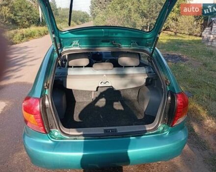 Зеленый Киа Рио, объемом двигателя 1.5 л и пробегом 270 тыс. км за 2600 $, фото 14 на Automoto.ua