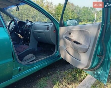 Зеленый Киа Рио, объемом двигателя 1.5 л и пробегом 270 тыс. км за 2600 $, фото 13 на Automoto.ua