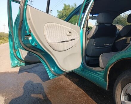 Зеленый Киа Рио, объемом двигателя 1.5 л и пробегом 270 тыс. км за 2600 $, фото 10 на Automoto.ua