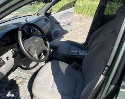 Зеленый Киа Рио, объемом двигателя 1.5 л и пробегом 128 тыс. км за 2802 $, фото 6 на Automoto.ua