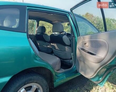 Зеленый Киа Рио, объемом двигателя 1.5 л и пробегом 270 тыс. км за 2600 $, фото 11 на Automoto.ua