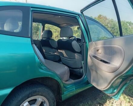 Зеленый Киа Рио, объемом двигателя 1.5 л и пробегом 270 тыс. км за 2600 $, фото 12 на Automoto.ua