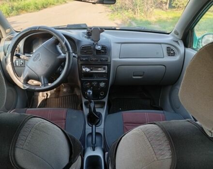 Зеленый Киа Рио, объемом двигателя 1.5 л и пробегом 270 тыс. км за 2600 $, фото 18 на Automoto.ua