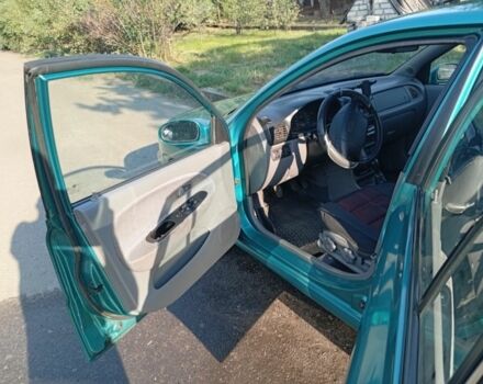 Зеленый Киа Рио, объемом двигателя 1.5 л и пробегом 270 тыс. км за 2600 $, фото 9 на Automoto.ua