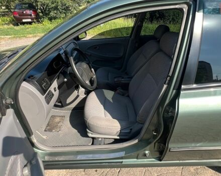 Зелений Кіа Ріо, об'ємом двигуна 1.49 л та пробігом 128 тис. км за 2700 $, фото 6 на Automoto.ua