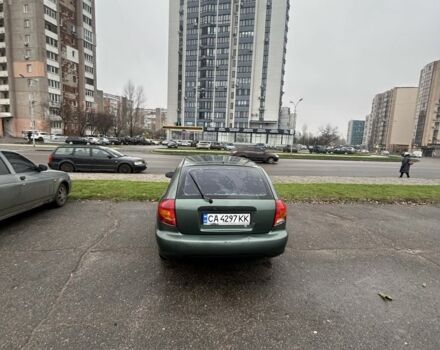 Зеленый Киа Рио, объемом двигателя 1.5 л и пробегом 235 тыс. км за 2600 $, фото 1 на Automoto.ua