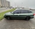 Зеленый Киа Рио, объемом двигателя 1.5 л и пробегом 235 тыс. км за 2600 $, фото 2 на Automoto.ua