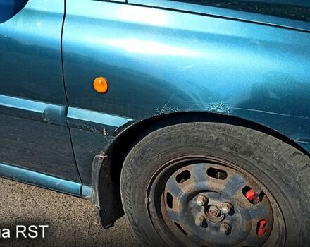 Зеленый Киа Рио, объемом двигателя 1.3 л и пробегом 240 тыс. км за 3000 $, фото 2 на Automoto.ua