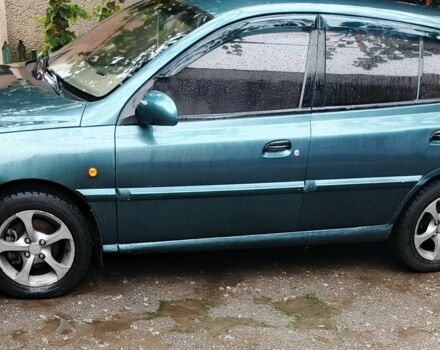 Зелений Кіа Ріо, об'ємом двигуна 1.3 л та пробігом 554 тис. км за 2800 $, фото 4 на Automoto.ua