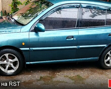 Зелений Кіа Ріо, об'ємом двигуна 1.3 л та пробігом 557 тис. км за 2200 $, фото 2 на Automoto.ua