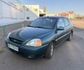 Зелений Кіа Ріо, об'ємом двигуна 1.3 л та пробігом 260 тис. км за 1904 $, фото 1 на Automoto.ua