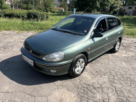 Зеленый Киа Рио, объемом двигателя 1.5 л и пробегом 128 тыс. км за 2802 $, фото 1 на Automoto.ua