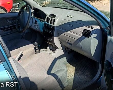 Зеленый Киа Рио, объемом двигателя 1.3 л и пробегом 240 тыс. км за 3000 $, фото 1 на Automoto.ua
