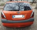 Оранжевый Киа Рио, объемом двигателя 1.4 л и пробегом 181 тыс. км за 5100 $, фото 3 на Automoto.ua