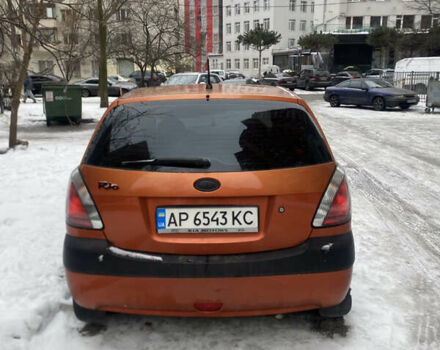 Оранжевый Киа Рио, объемом двигателя 1.4 л и пробегом 259 тыс. км за 4200 $, фото 4 на Automoto.ua