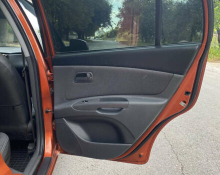 Помаранчевий Кіа Ріо, об'ємом двигуна 1.4 л та пробігом 257 тис. км за 4500 $, фото 8 на Automoto.ua