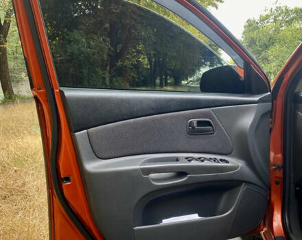 Оранжевый Киа Рио, объемом двигателя 1.4 л и пробегом 251 тыс. км за 4650 $, фото 10 на Automoto.ua