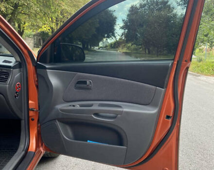 Оранжевый Киа Рио, объемом двигателя 1.4 л и пробегом 258 тыс. км за 4600 $, фото 17 на Automoto.ua