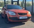 Оранжевый Киа Рио, объемом двигателя 1.4 л и пробегом 263 тыс. км за 4490 $, фото 1 на Automoto.ua