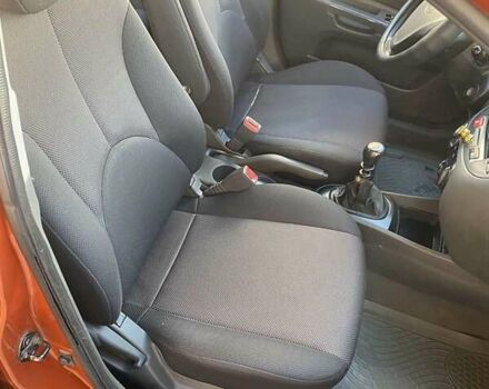 Оранжевый Киа Рио, объемом двигателя 1.4 л и пробегом 322 тыс. км за 4100 $, фото 11 на Automoto.ua