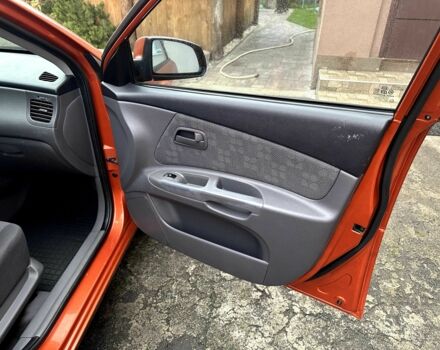 Оранжевый Киа Рио, объемом двигателя 1.4 л и пробегом 150 тыс. км за 4200 $, фото 12 на Automoto.ua
