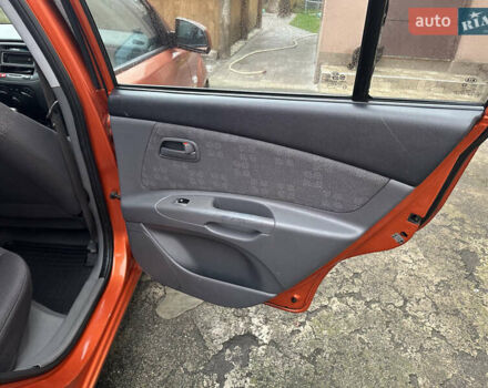 Оранжевый Киа Рио, объемом двигателя 1.4 л и пробегом 150 тыс. км за 4200 $, фото 15 на Automoto.ua