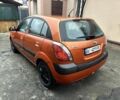 Оранжевый Киа Рио, объемом двигателя 1.4 л и пробегом 150 тыс. км за 4200 $, фото 6 на Automoto.ua