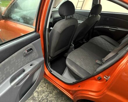 Оранжевый Киа Рио, объемом двигателя 1.4 л и пробегом 150 тыс. км за 4200 $, фото 10 на Automoto.ua