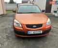 Оранжевый Киа Рио, объемом двигателя 1.4 л и пробегом 150 тыс. км за 4200 $, фото 1 на Automoto.ua