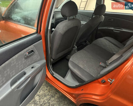 Оранжевый Киа Рио, объемом двигателя 1.4 л и пробегом 150 тыс. км за 4200 $, фото 10 на Automoto.ua