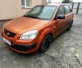 Оранжевый Киа Рио, объемом двигателя 1.4 л и пробегом 150 тыс. км за 4200 $, фото 1 на Automoto.ua