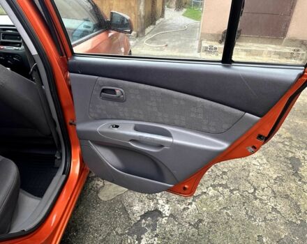 Оранжевый Киа Рио, объемом двигателя 1.4 л и пробегом 150 тыс. км за 4200 $, фото 15 на Automoto.ua