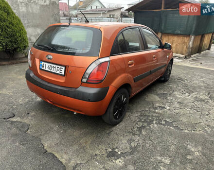 Оранжевый Киа Рио, объемом двигателя 1.4 л и пробегом 150 тыс. км за 4200 $, фото 4 на Automoto.ua