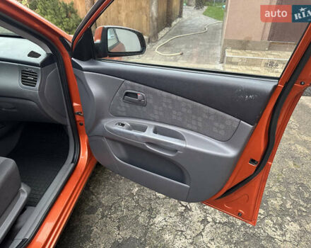 Оранжевый Киа Рио, объемом двигателя 1.4 л и пробегом 150 тыс. км за 4200 $, фото 12 на Automoto.ua