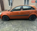 Оранжевый Киа Рио, объемом двигателя 1.4 л и пробегом 150 тыс. км за 4200 $, фото 7 на Automoto.ua