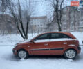 Оранжевый Киа Рио, объемом двигателя 1.4 л и пробегом 232 тыс. км за 4650 $, фото 1 на Automoto.ua
