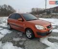 Помаранчевий Кіа Ріо, об'ємом двигуна 1.4 л та пробігом 210 тис. км за 4500 $, фото 1 на Automoto.ua