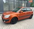 Оранжевый Киа Рио, объемом двигателя 1.4 л и пробегом 234 тыс. км за 3850 $, фото 3 на Automoto.ua