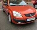 Оранжевый Киа Рио, объемом двигателя 1.4 л и пробегом 247 тыс. км за 3800 $, фото 1 на Automoto.ua