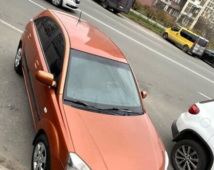 Оранжевый Киа Рио, объемом двигателя 1.4 л и пробегом 165 тыс. км за 4500 $, фото 3 на Automoto.ua